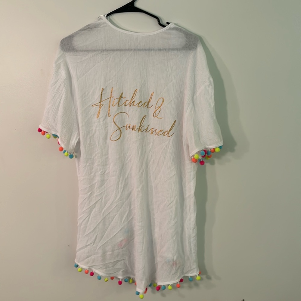 Super cute for a honeymoon never worn bathing suit cover-up